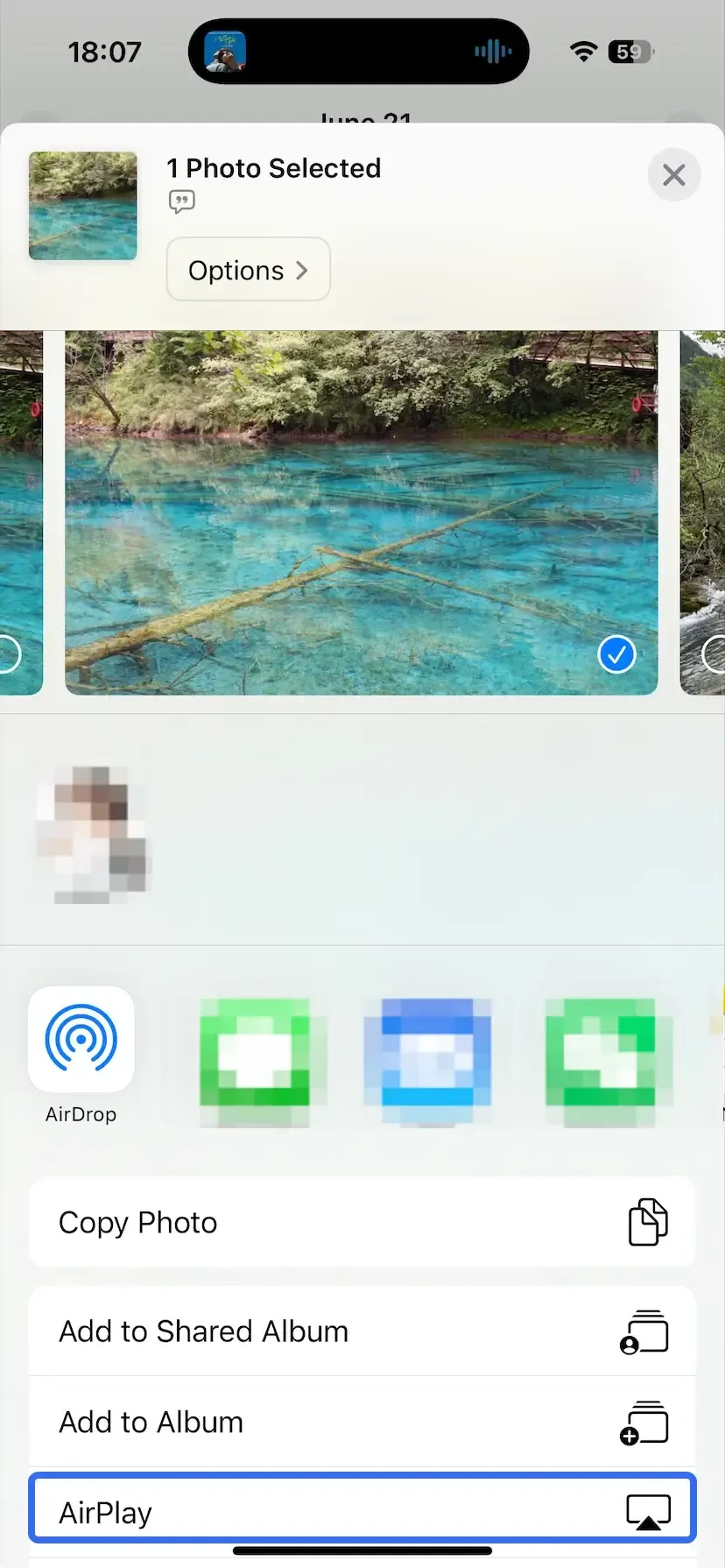 choose AirPlay in the Photos app