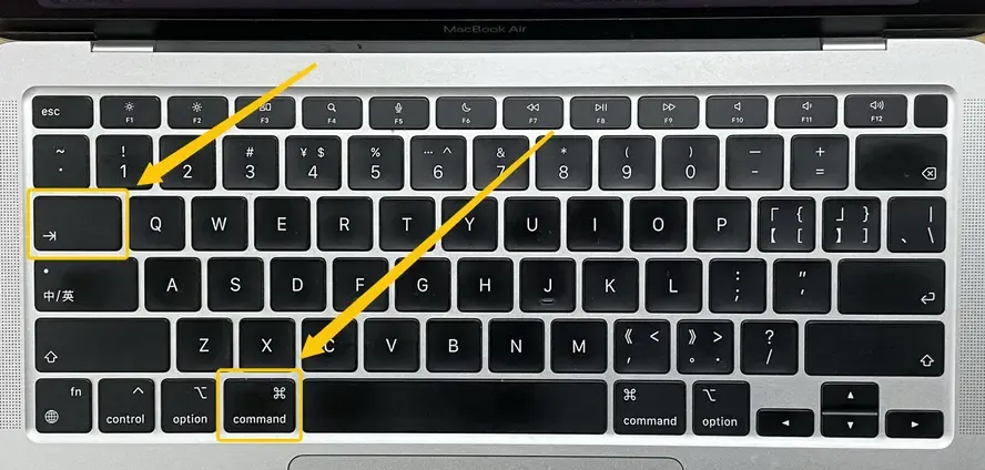 Command (⌘) + Tab
